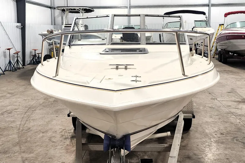 Slide: The Image of 1999 Campion Explorer 552 boat in indoor storage, front view. - 3