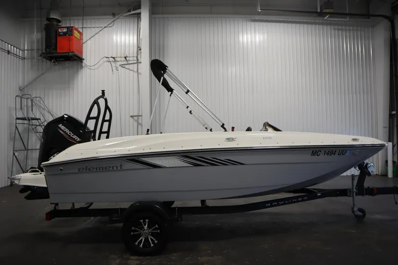 Slide: The Image of 2022 Bayliner E18 Element boat in indoor storage, side view. - 4