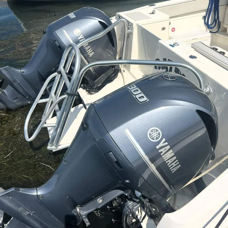 Slide: The Image of Twin Yamaha 300 outboard engines on a 2016 World Cat 320 DC boat. - 29