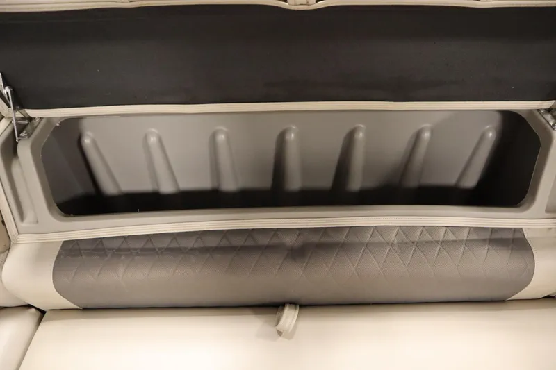 Slide: The Image of 2022 Tracker 20 Party Barge DLX storage compartment with cushioned seating. - 17