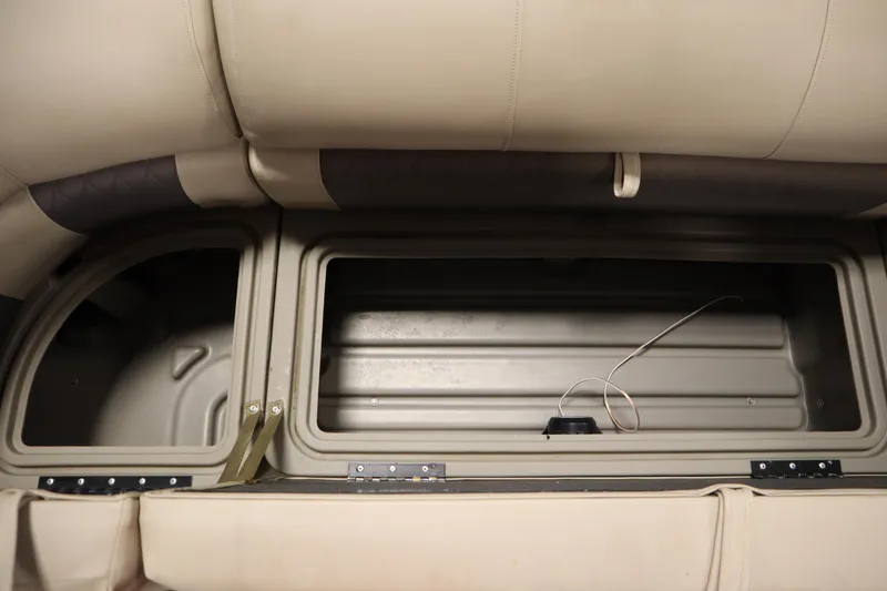 Slide: The Image of Storage compartment in 2022 Tracker 20 Party Barge DLX pontoon boat. - 18