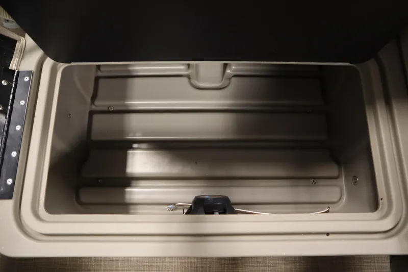 Slide: The Image of Open storage compartment in 2022 Tracker 20 Party Barge DLX boat. - 42