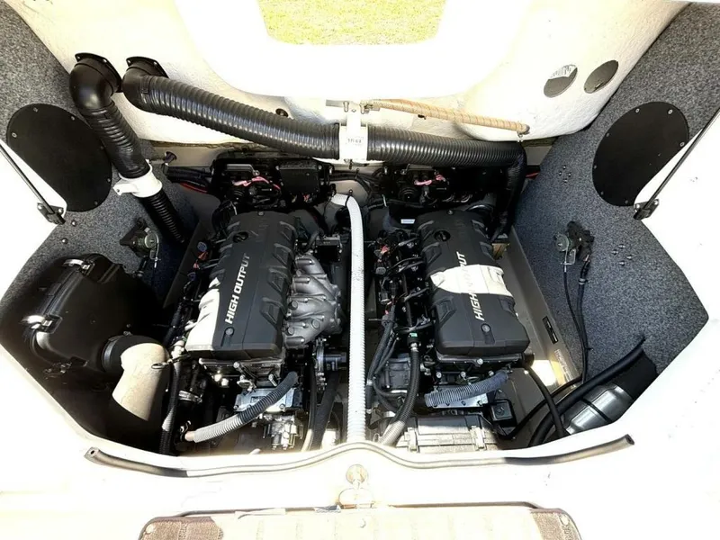 Slide: The Image of Engine compartment of 2013 Yamaha Boats 242 Limited S, featuring dual high-output engines. - 33
