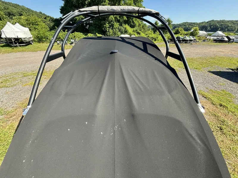 Slide: The Image of Covered 2013 Yamaha Boats 242 Limited S in outdoor storage area. - 38