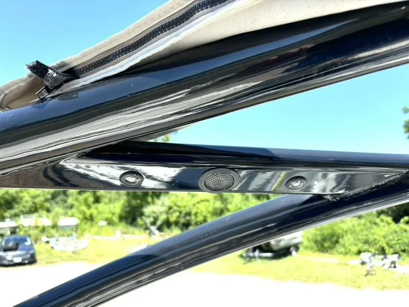 Slide: The Image of Close-up of 2013 Yamaha Boats 242 Limited S frame detail under sunny sky. - 32