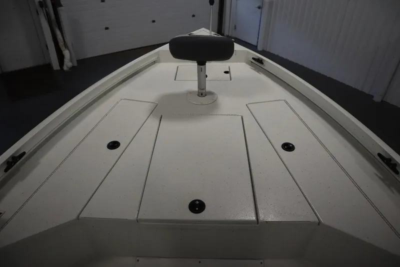 Slide: The Image of 2020 Sun Tracker Party Barge 20 DLX deck with storage compartments and seat. - 11