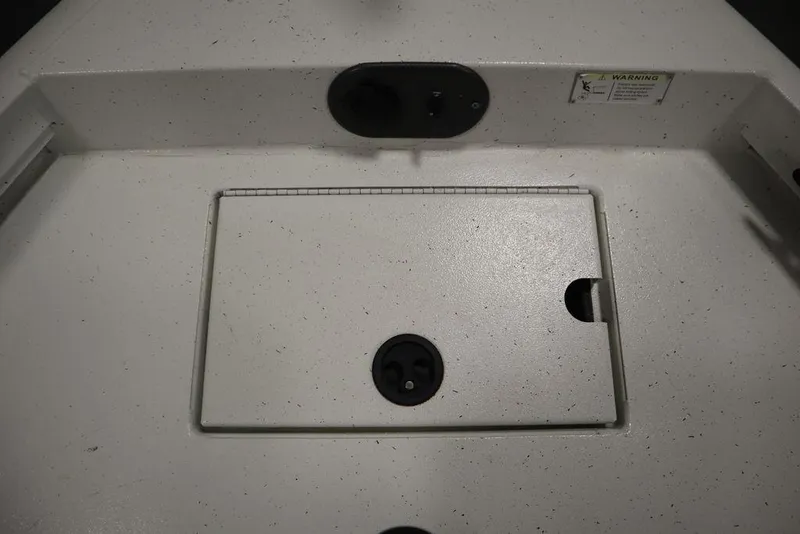 Slide: The Image of 2020 Sun Tracker Party Barge 20 DLX deck detail with storage compartment. - 12