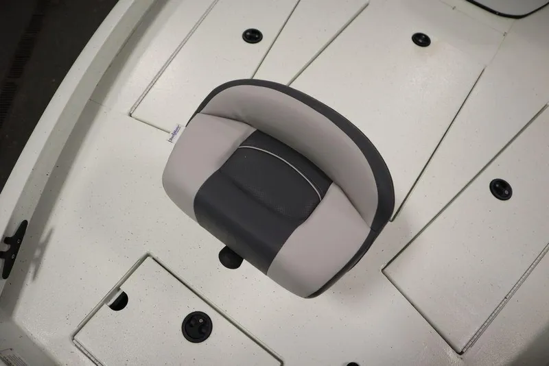 Slide: The Image of 2020 Sun Tracker Party Barge 20 DLX boat seat on white deck. - 13