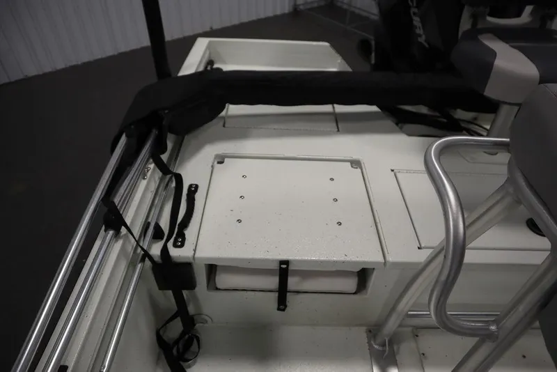 Slide: The Image of 2020 Sun Tracker Party Barge 20 DLX interior with seating and storage area. - 37