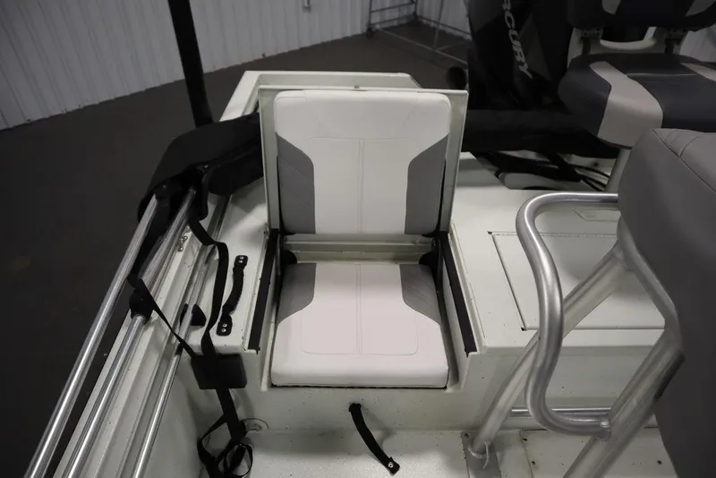 Slide: The Image of 2020 Sun Tracker Party Barge 20 DLX boat seat with storage compartment open. - 38