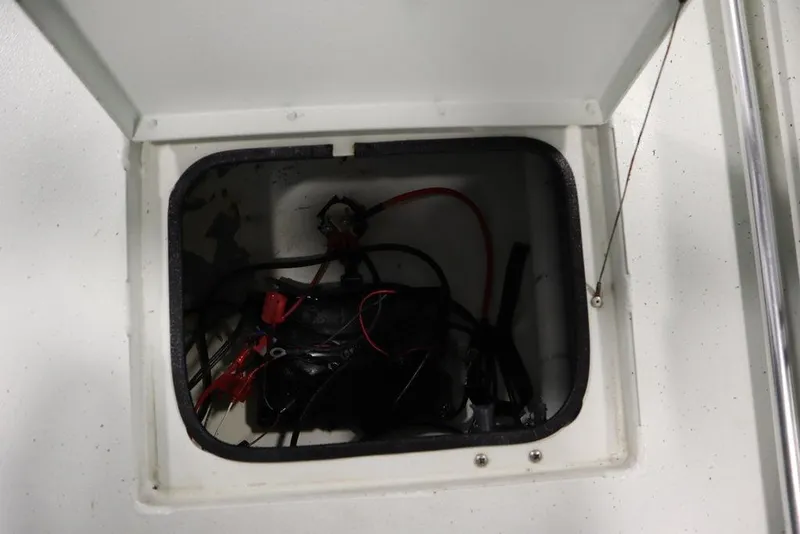 Slide: The Image of Storage compartment with wiring in a 2020 Sun Tracker Party Barge 20 DLX boat. - 41