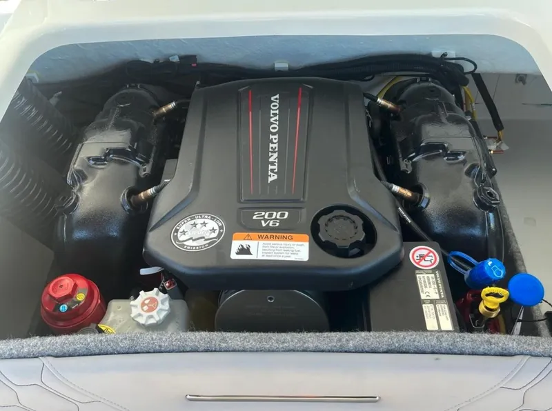 Slide: The Image of 2023 Four Winns H1 boat engine, Volvo Penta 200 V6, detailed view. - 11