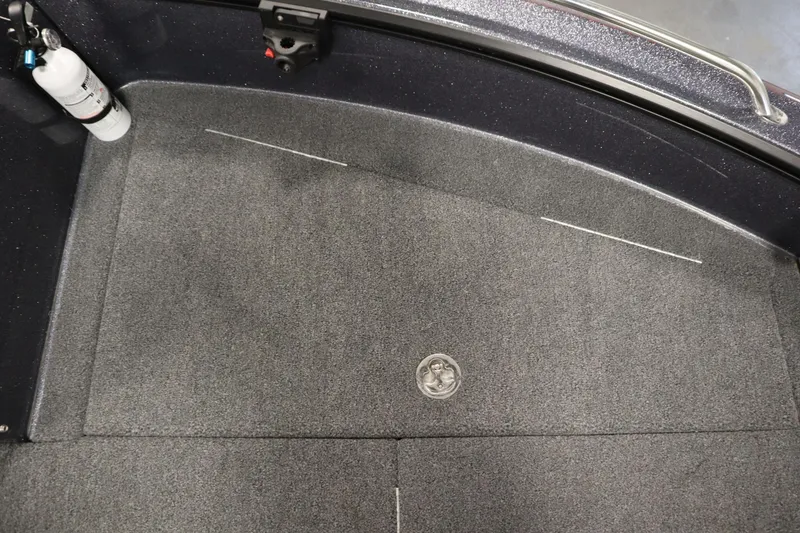 Slide: The Image of 2023 Lund 189 PRO V boat interior with carpeted floor and safety equipment. - 16