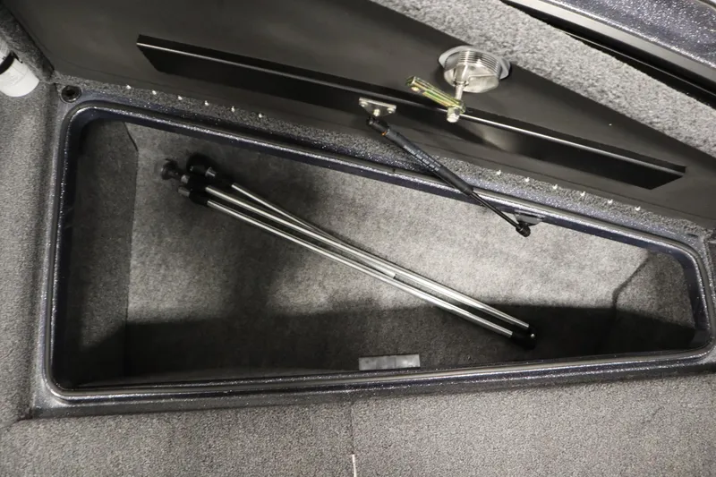 Slide: The Image of 2023 Lund 189 PRO V storage compartment with tripod inside. - 17