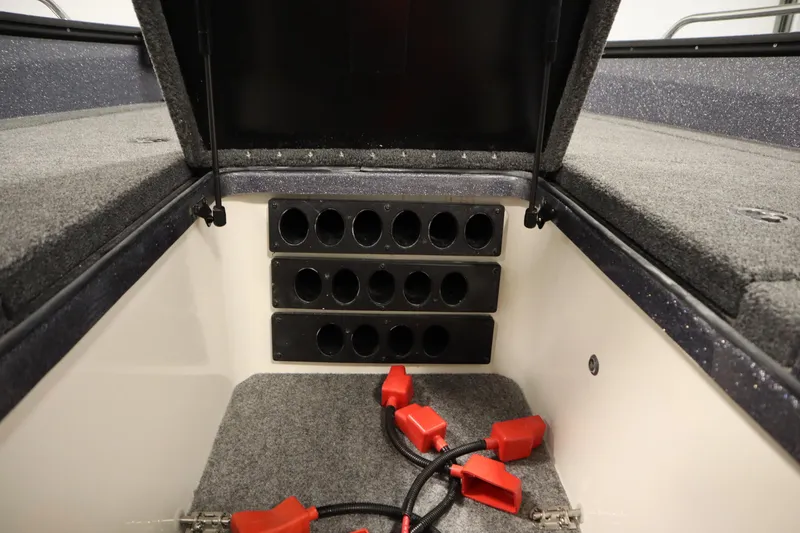 Slide: The Image of Interior of 2023 Lund 189 PRO V boat showing storage compartments and wiring. - 23