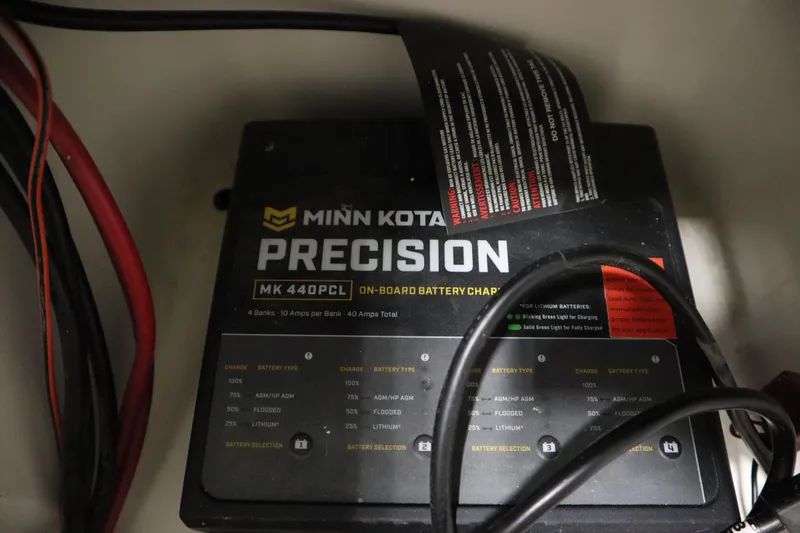 Slide: The Image of Minn Kota Precision MK 440PCL on-board battery charger in 2023 Lund 189 PRO V boat. - 24