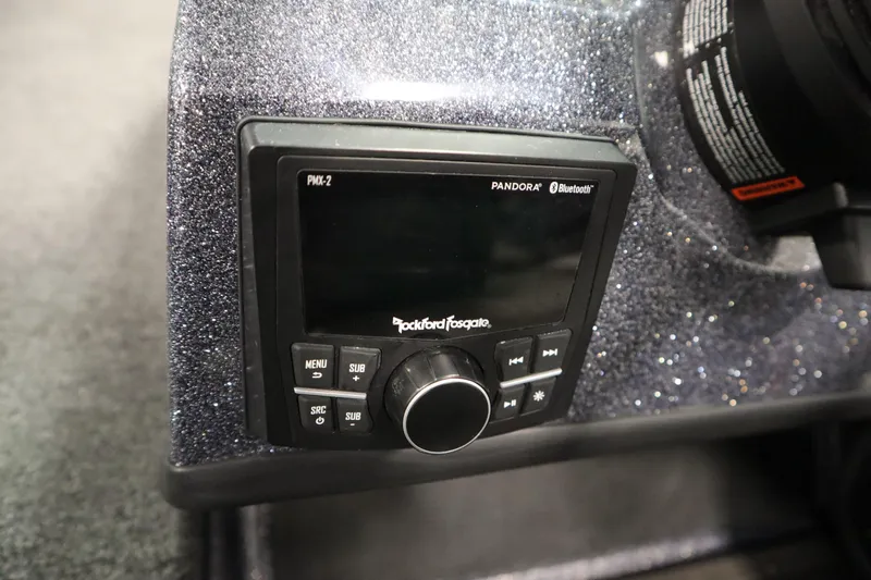 Slide: The Image of 2023 Lund 189 PRO V boat dashboard with Rockford Fosgate PMX-2 audio system. - 30