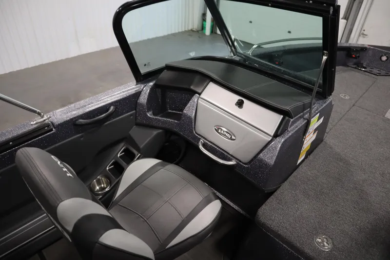 Slide: The Image of 2023 Lund 189 PRO V boat interior with steering console and seating. - 34