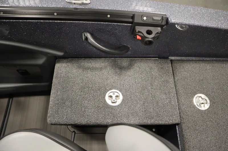 Slide: The Image of 2023 Lund 189 PRO V boat interior with storage compartments and seating. - 42