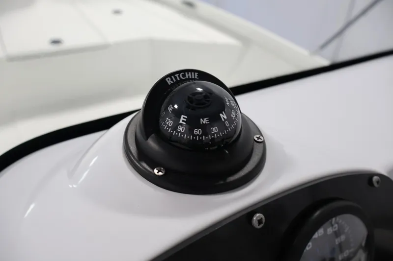 Slide: The Image of Compass on 2022 Crestliner 2200 Bay boat dashboard, featuring Ritchie navigation. - 25