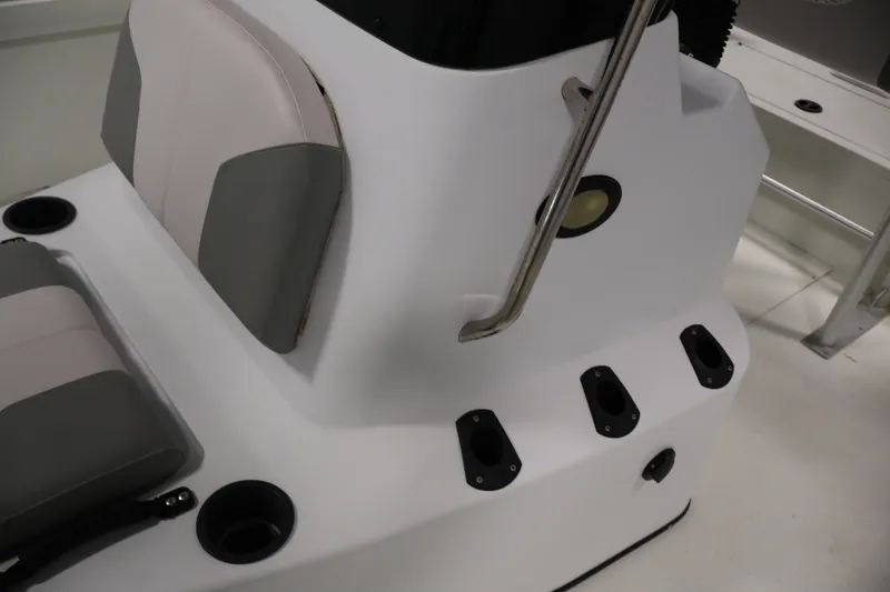 Slide: The Image of 2022 Crestliner 2200 Bay boat interior with seating and rod holders. - 22