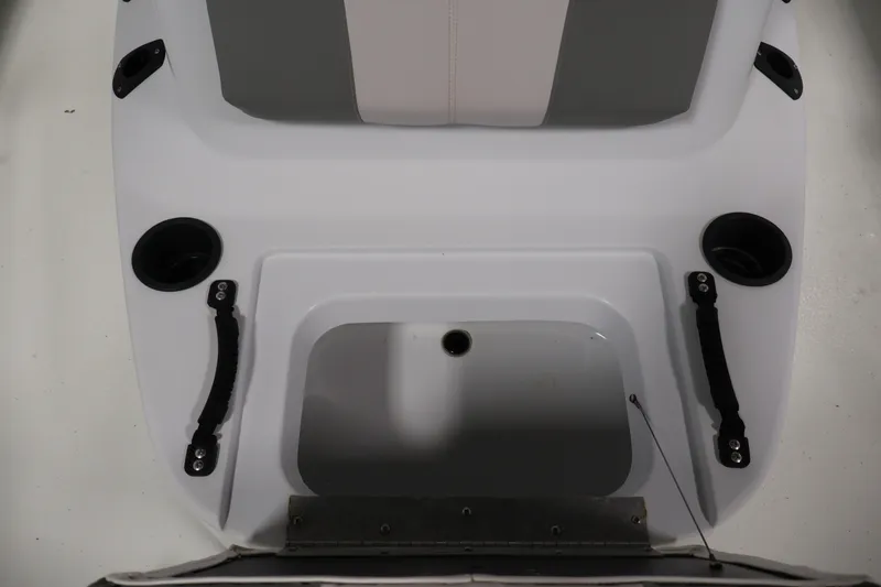 Slide: The Image of 2022 Crestliner 2200 Bay boat interior with cup holders and seating area. - 20