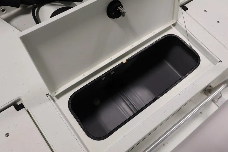 Slide: The Image of Open storage compartment on 2022 Crestliner 2200 Bay boat, showcasing interior space. - 38
