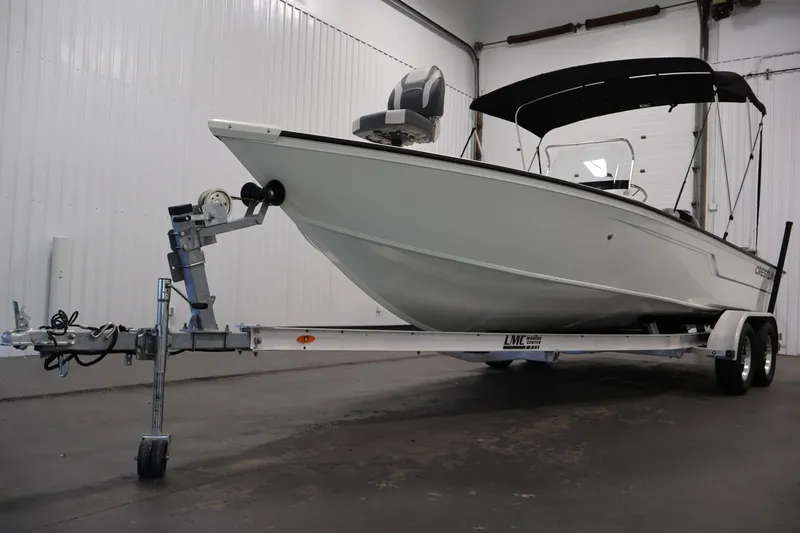 Slide: The Image of 2022 Crestliner 2200 Bay boat on trailer in indoor storage facility. - 46