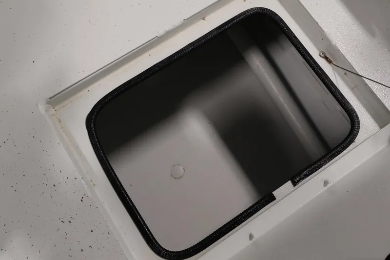 Slide: The Image of Open storage compartment on 2022 Crestliner 2200 Bay boat. - 40