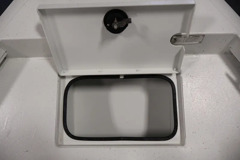 Slide: The Image of Open storage compartment on a 2022 Crestliner 2200 Bay boat. - 13