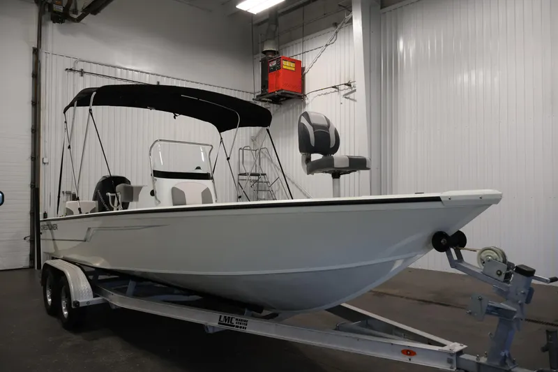 Slide: The Image of 2022 Crestliner 2200 Bay boat on trailer in indoor storage facility. - 4