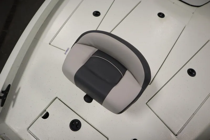 Slide: The Image of Crestliner 2200 CC 2022 boat seat on white deck, top view. - 15