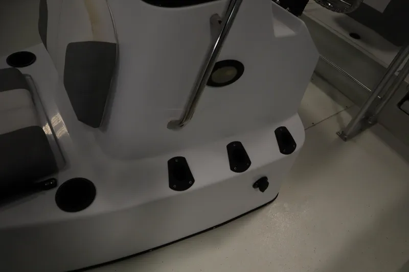 Slide: The Image of 2022 Crestliner 2200 CC boat interior with seating and cup holders. - 21