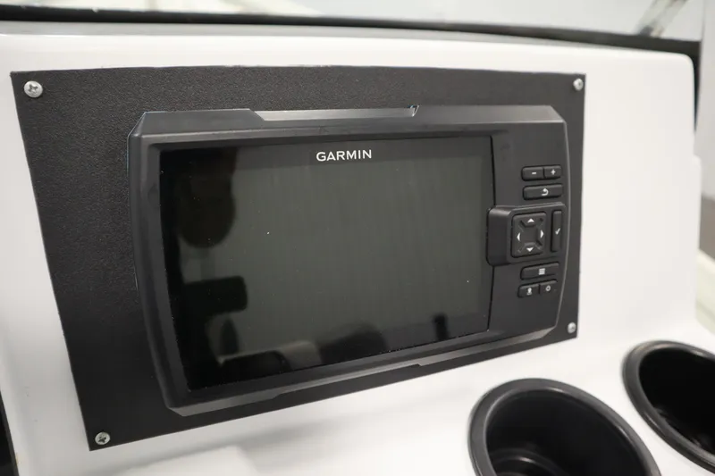 Slide: The Image of Garmin display on 2022 Crestliner 2200 CC boat dashboard with cup holders. - 27