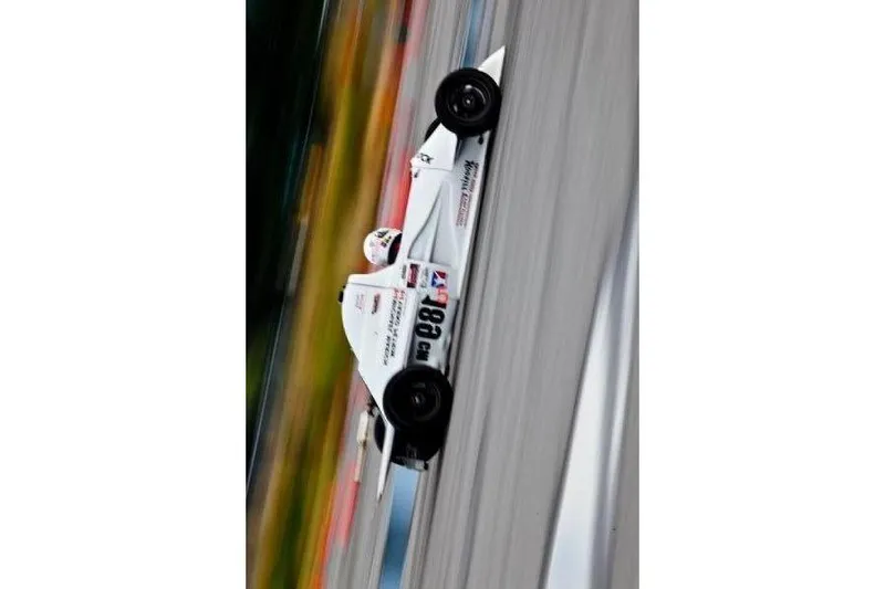 Slide: The Image of Race car speeding on track, 33rd Strike Group FOX-3637, 2026 model. - 11