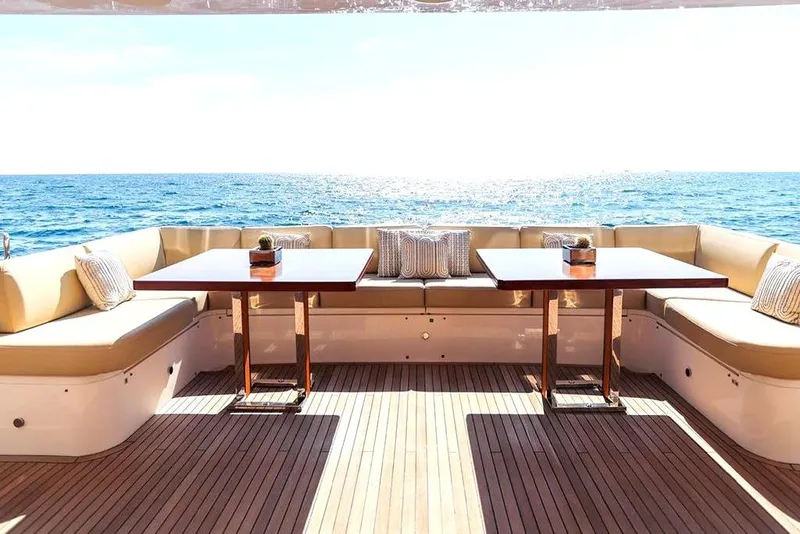 Slide: The Image of Luxurious yacht deck with seating, tables, and ocean view, 33rd Strike Group FOX-3637, 2026 model. - 4