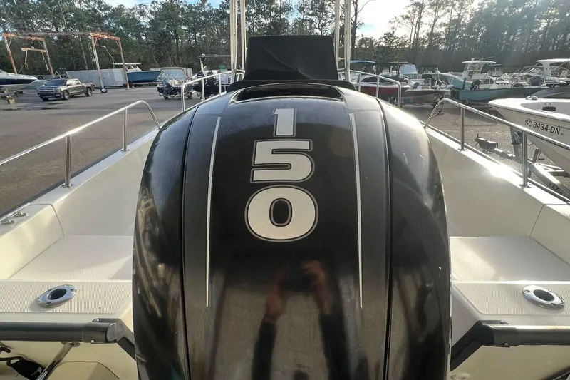 Slide: The Image of Outboard motor labeled "150" on a 33rd Strike Group FOX-3637 boat, 2026 model. - 91