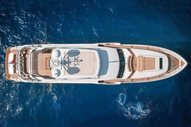 Slide: The Image of Aerial view of 2026 33rd Strike Group FOX-3637 yacht on blue ocean water. - 96