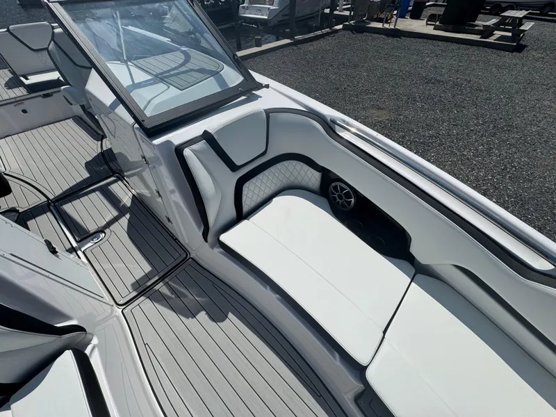 Slide: The Image of 2025 Yamaha Boats 252S interior with sleek seating and modern design. - 13