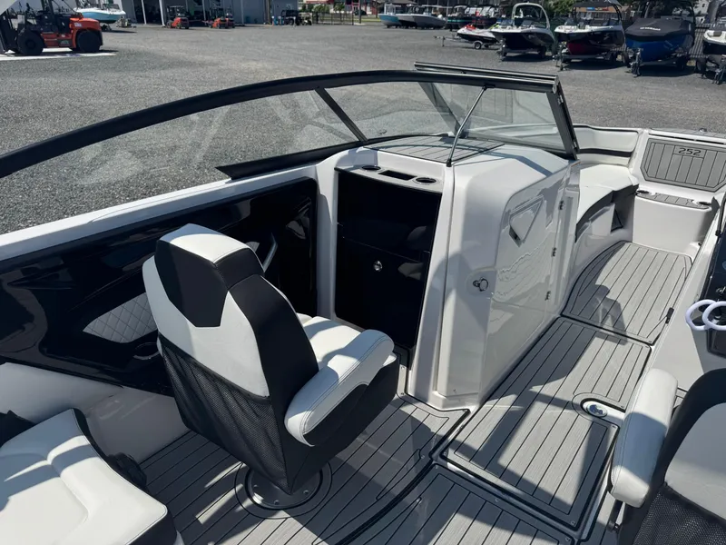 Slide: The Image of 2025 Yamaha Boats 252S interior with sleek seating and modern design. - 15