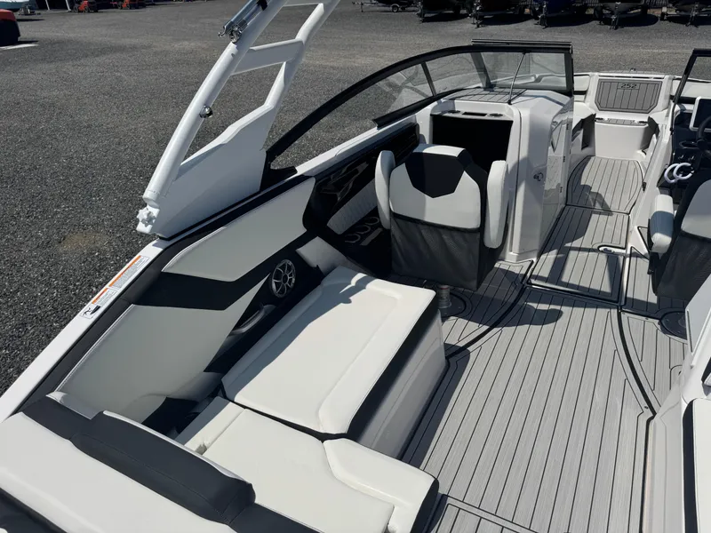 Slide: The Image of 2025 Yamaha Boats 252S interior with sleek seating and modern design. - 18