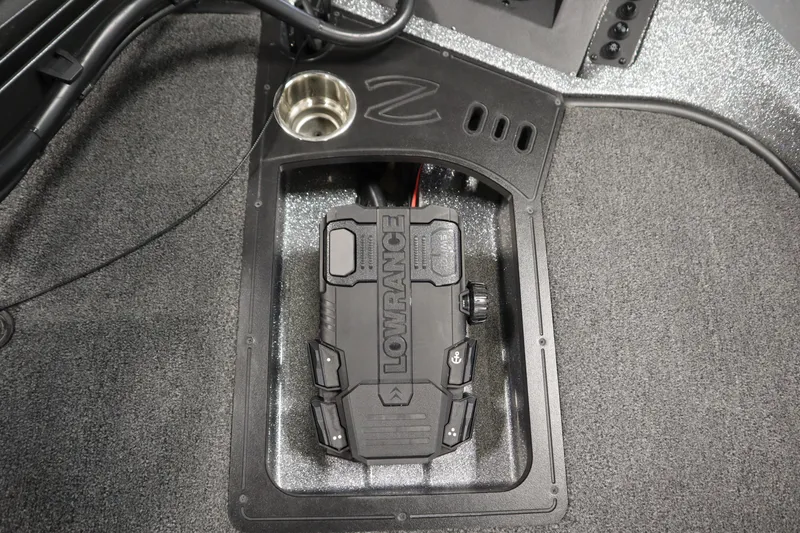 Slide: The Image of 2023 Ranger Z519 boat console with Lowrance electronics and cup holder. - 16