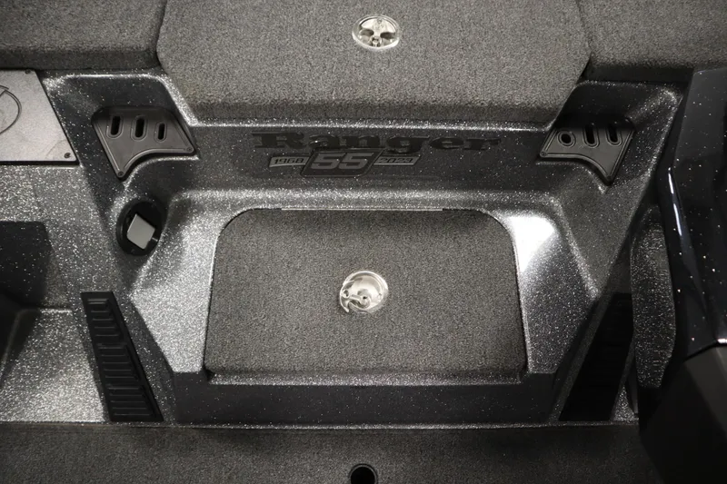 Slide: The Image of 2023 Ranger Z519 boat interior with textured flooring and storage compartments. - 24