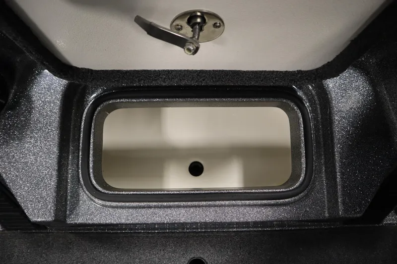 Slide: The Image of 2023 Ranger Z519 storage compartment with latch, featuring a sleek, metallic finish. - 25
