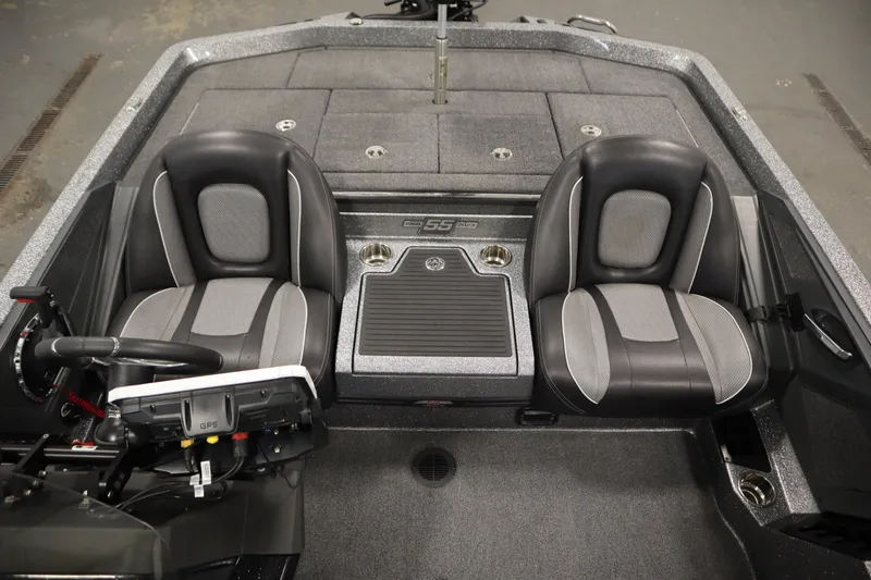 Slide: The Image of 2023 Ranger Z519 boat interior with dual seats and GPS system. - 26