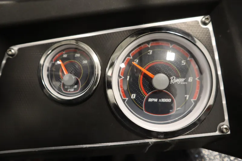 Slide: The Image of Dashboard gauges of 2023 Ranger Z519 boat, showing RPM and PSI readings. - 36