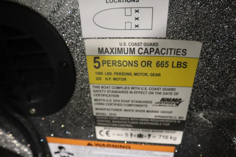 Slide: The Image of 2023 Ranger Z519 capacity label: 5 persons or 665 lbs, 225 HP motor. - 40