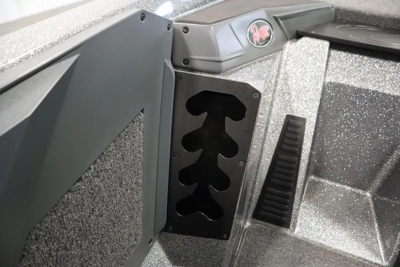 Slide: The Image of 2023 Ranger Z519 boat interior with rod holder and textured surfaces. - 41