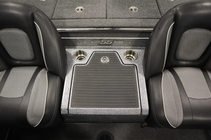 Slide: The Image of 2023 Ranger Z519 boat interior with dual seats and center console. - 42