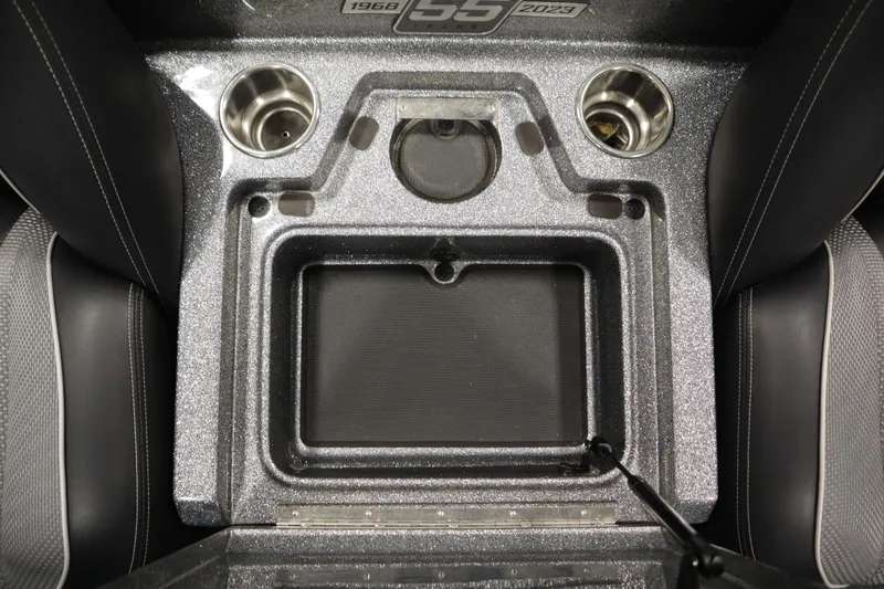 Slide: The Image of 2023 Ranger Z519 boat console with cup holders and storage compartment. - 43